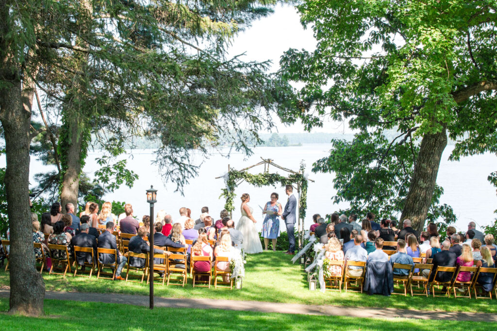 lakeside ceremony at elegant wedding at red crown lodge