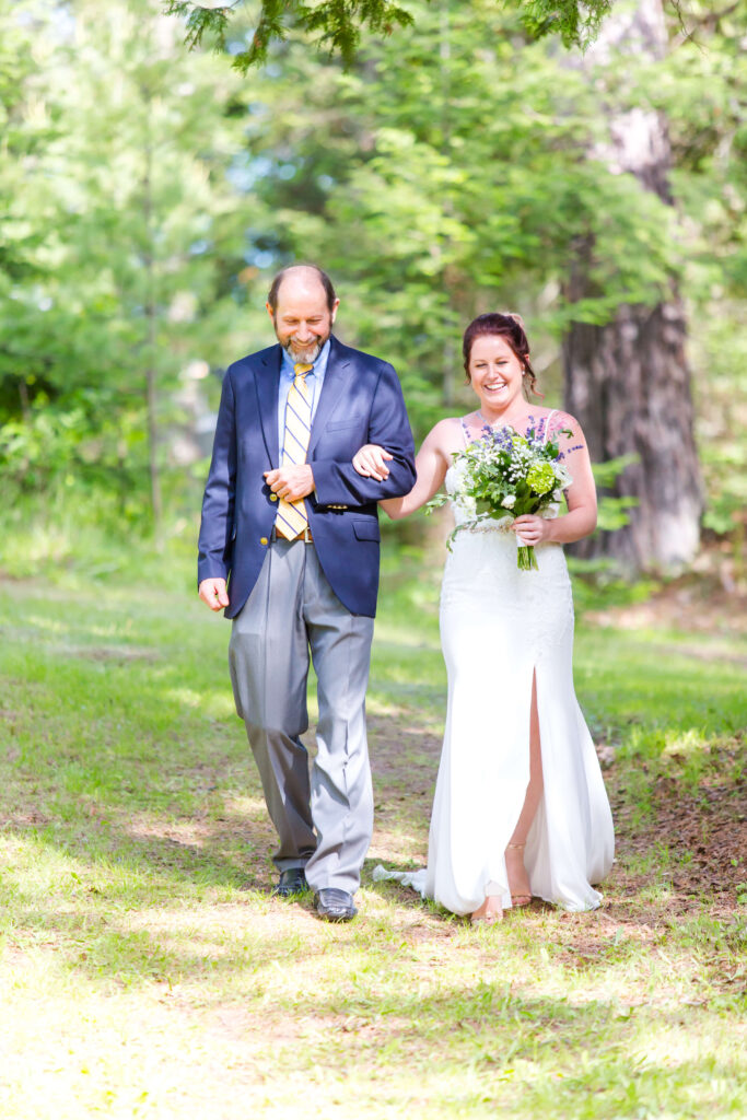 Bride & Dad coming down the aisle at Eagle River Cabin Wedding