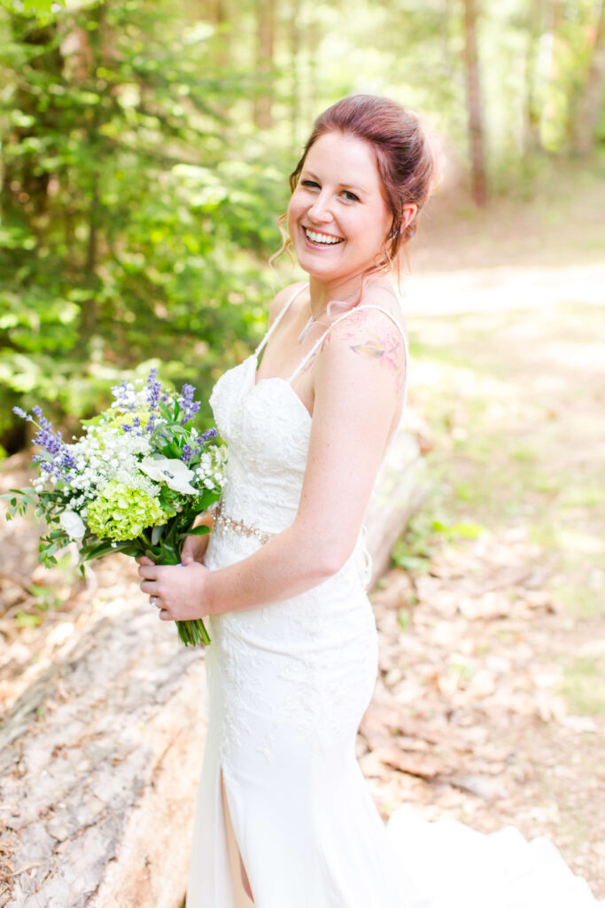 Bridal smiling portrait at her Eagle River Cabin Wedding
