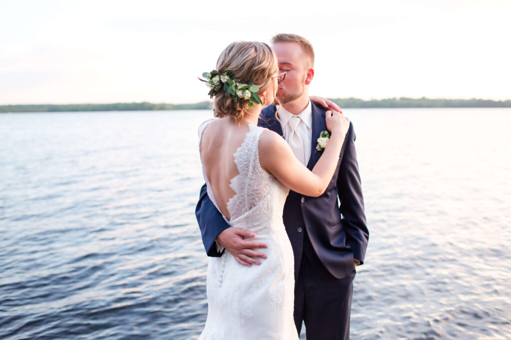 bride and groom golden hour photos on dock at eagle waters resort wedding