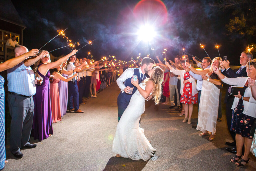 kiss and sparklers at Summer Wedding at 