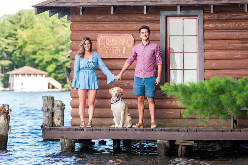 Photo of couple with golden lab on dock at howards point on Minocqua Lake. Minocqua Family Session Tips