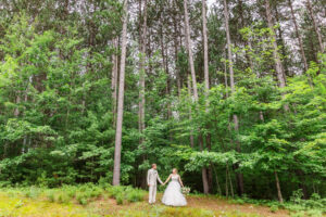 bride & groom summer wedding at the pines event center