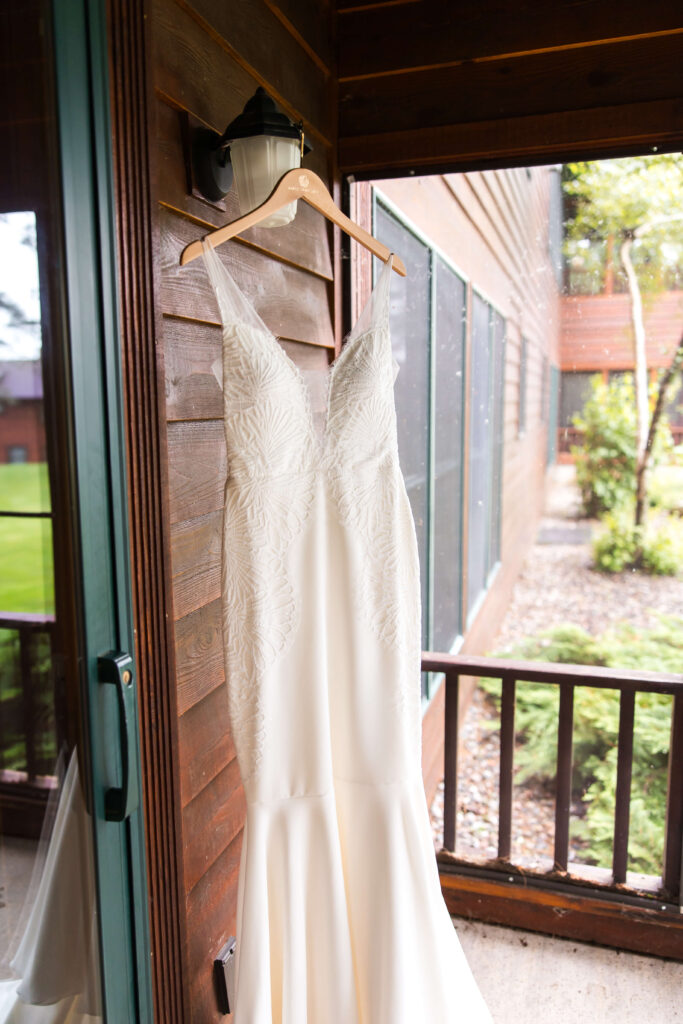 Bridal gown hanging outside at Chippewa Retreat Resort
