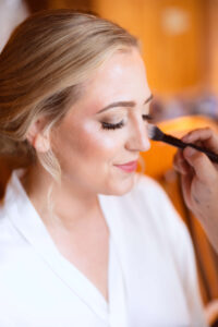 Bride getting her makeup done at Chippewa Retreat