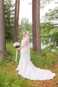 Bride's full length portrait outside at chippewa retreat resort