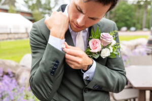 Groom getting ready at Chippewa Retreat Resort