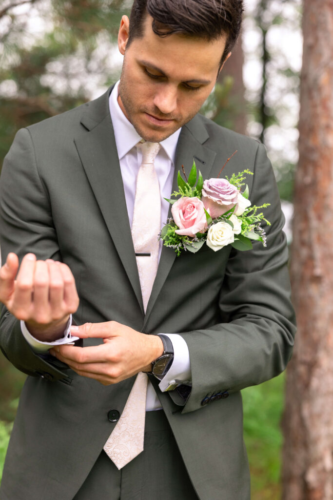 Groom getting ready at Chippewa Retreat Resort