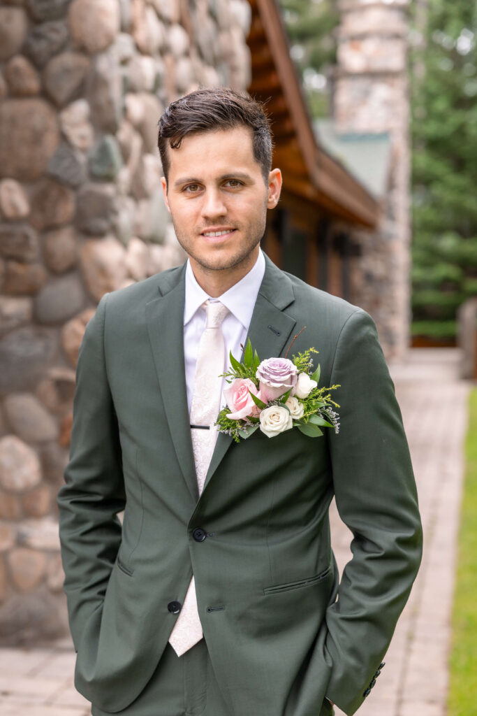 Groom's portrait outside at Chippewa Retreat