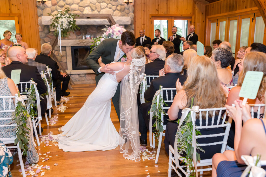 Bride & Groom coming down the aisle at Chippewa Retreat