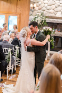 Bride & Groom coming down the aisle at Chippewa Retreat