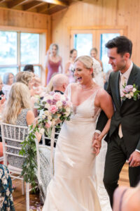 Bride & Groom coming down the aisle at Chippewa Retreat