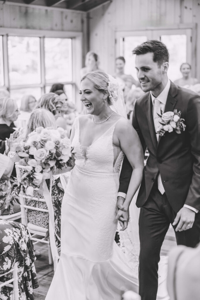 Bride & Groom coming down the aisle at Chippewa Retreat