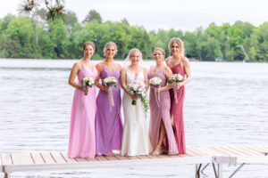 Bridesmaids on dock at Chippewa Retreat
