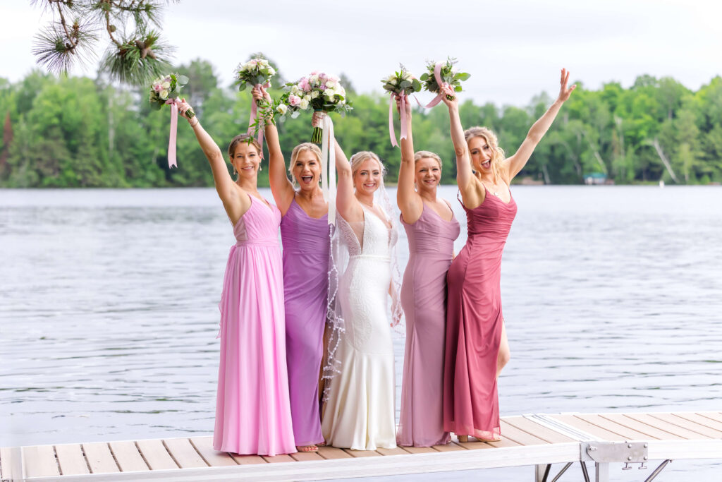 Bridesmaids on dock at Chippewa Retreat