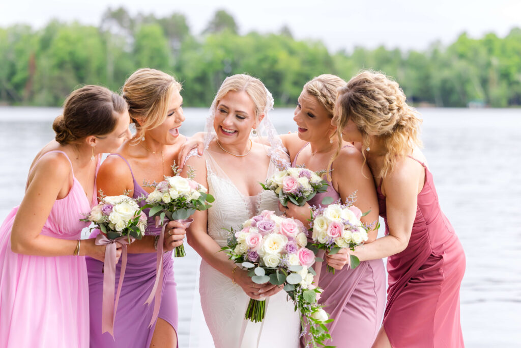 Bridesmaids on dock at Chippewa Retreat