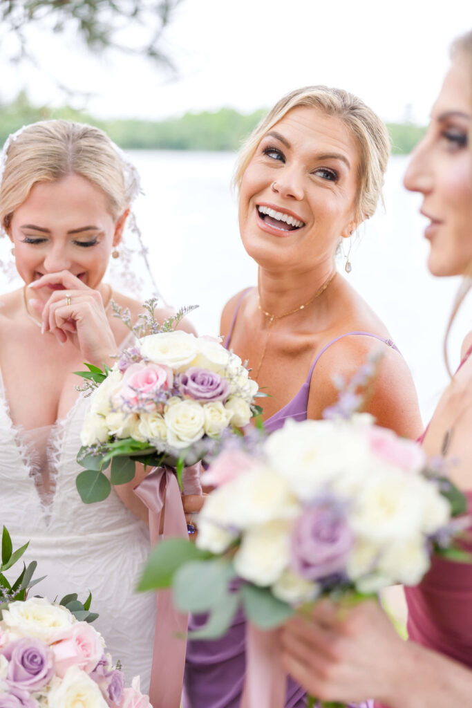 Bridesmaids on dock at Chippewa Retreat