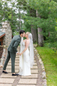Bride & Groom share a kiss at Chippewa Retreat Resort
