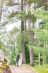 Bride & Groom share a kiss at Chippewa Retreat Resort