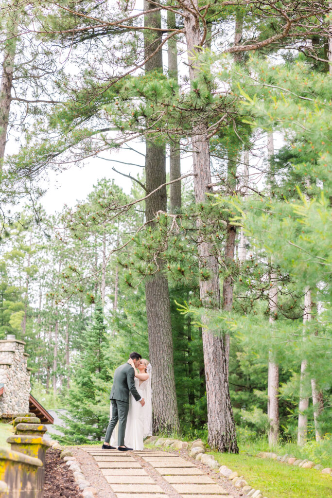 Bride & Groom share a kiss at Chippewa Retreat Resort