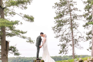 Bride & Groom share a kiss at Chippewa Retreat Resort