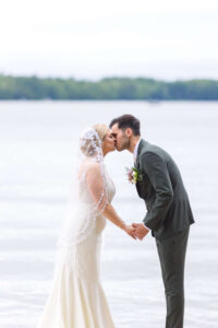 Bride & Groom share a kiss at Chippewa Retreat Resort