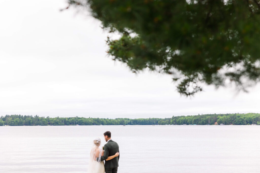 Bride & Groom share a kiss at Chippewa Retreat Resort