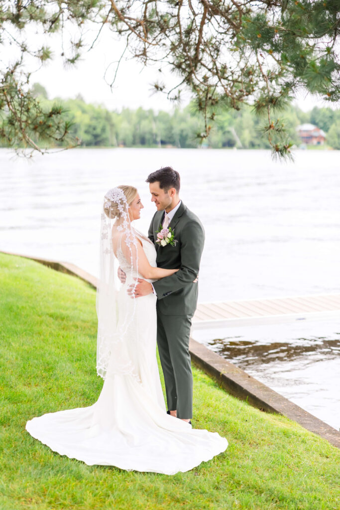 Bride & Groom posing for portraits at Chippewa Retreat