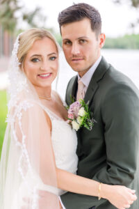 Bride & Groom posing for portraits at Chippewa Retreat