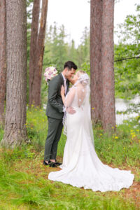 Bride & Groom posing for portraits at Chippewa Retreat