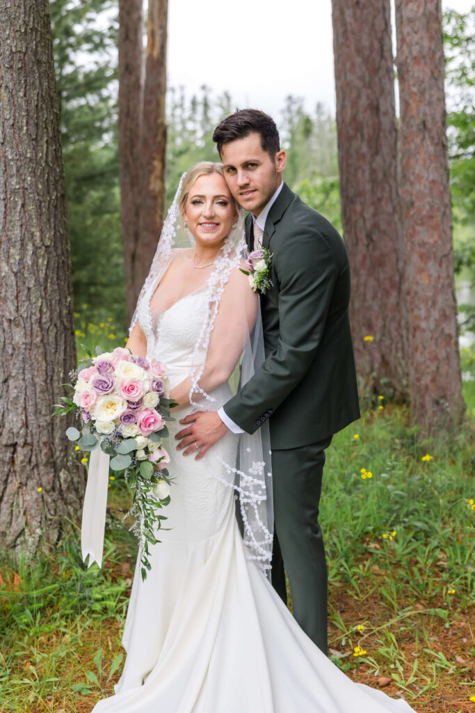 Bride & Groom posing for portraits at Chippewa Retreat