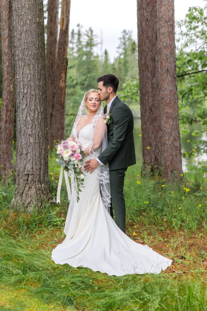 Bride & Groom posing for portraits at Chippewa Retreat
